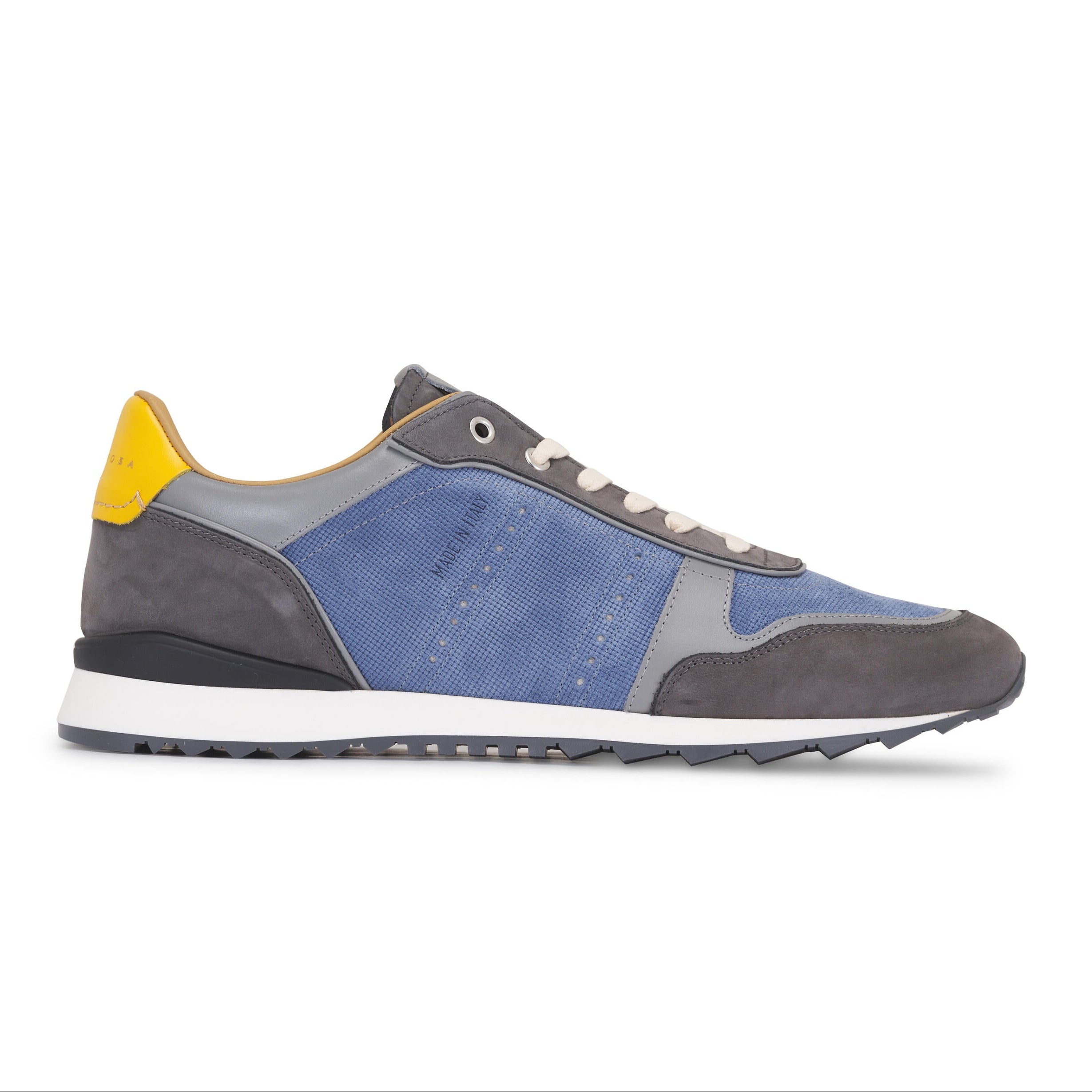 Gray and blue sneaker with yellow accent on a white background