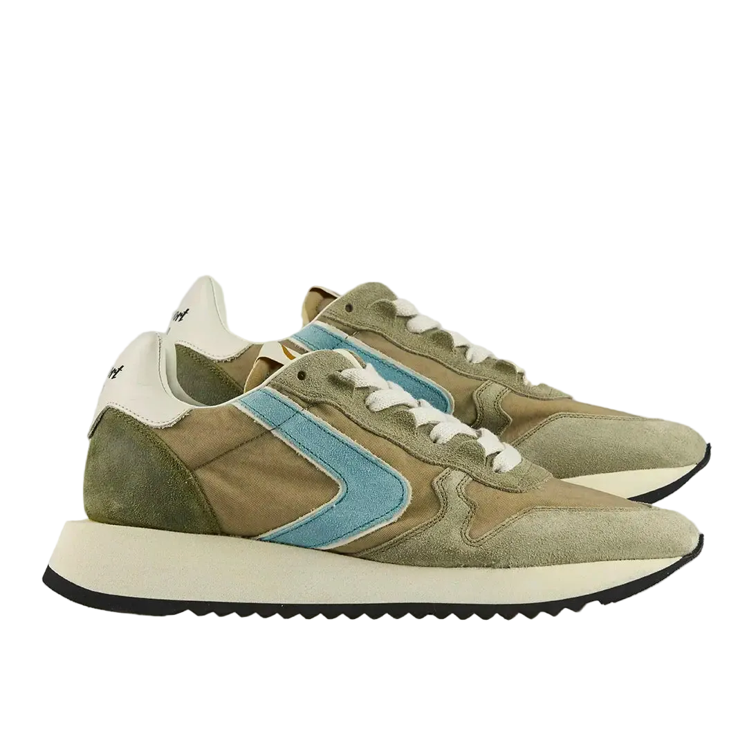 Pair of green and beige sneakers made in italy with blue accents on a light gray background
