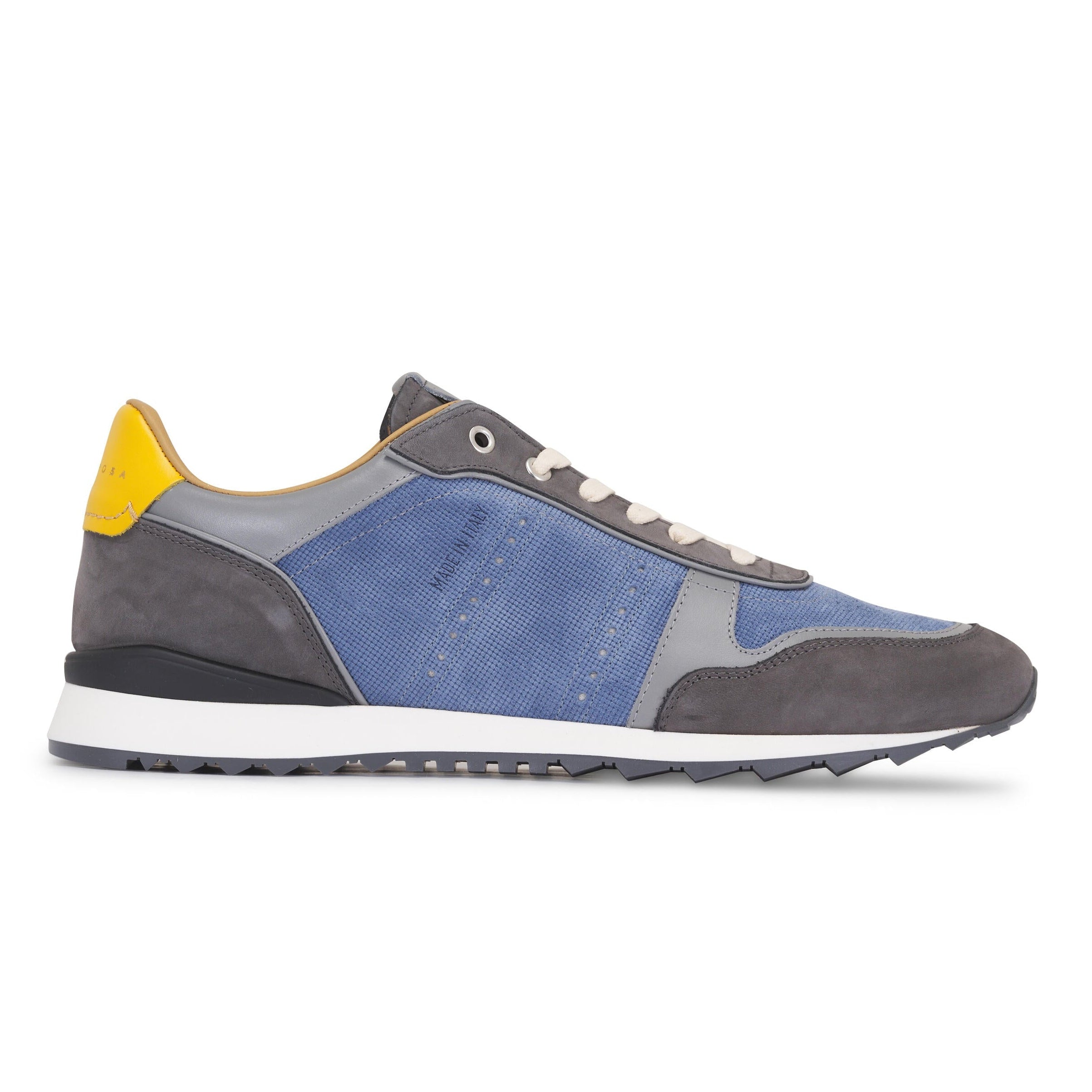 Gray and blue sneaker with yellow accent on a white background