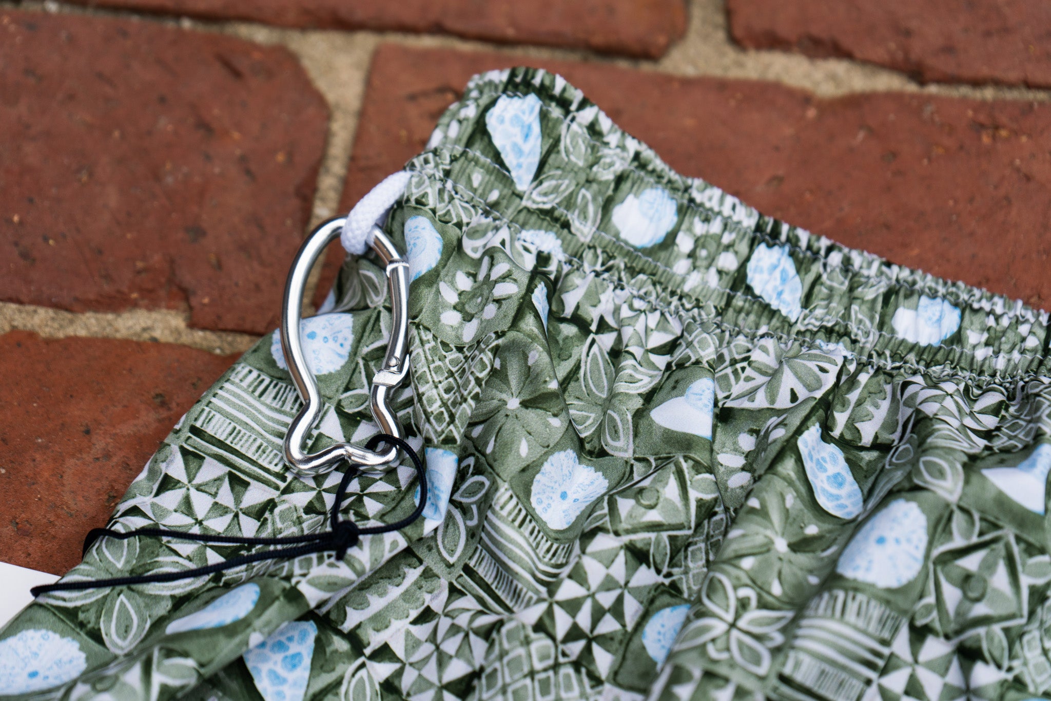 Green Seashell Swim Trunks